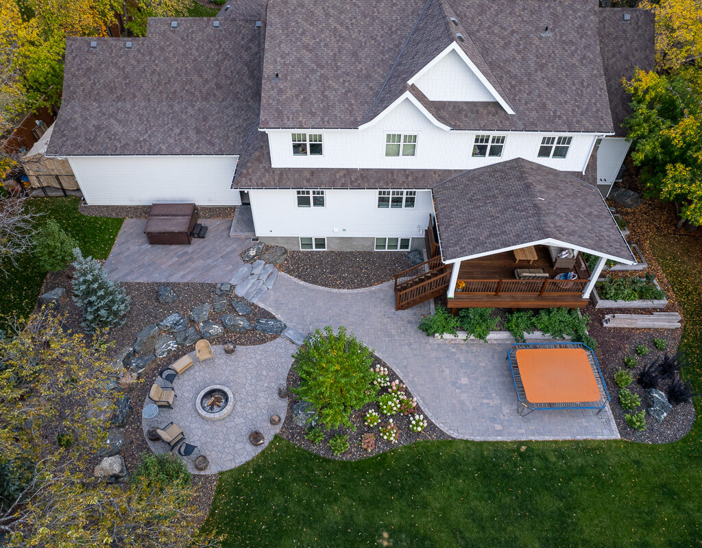 Limitless Landscaping custom patio and fire pit – Winnipeg Manitoba landscape design project