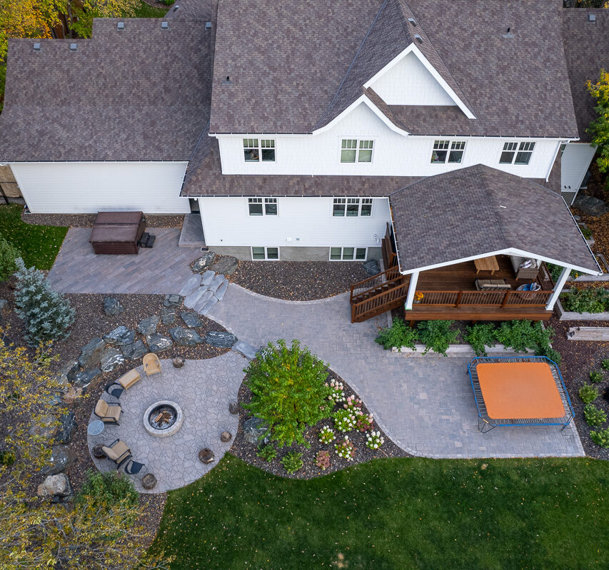 Limitless Landscaping custom patio and fire pit – Winnipeg Manitoba landscape design project