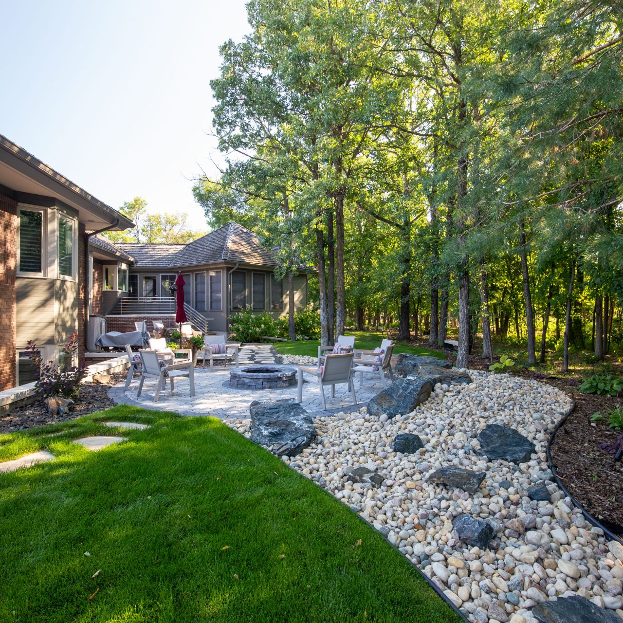 Limitless Landscaping custom softscaping and fire pit project in Winnipeg, Manitoba