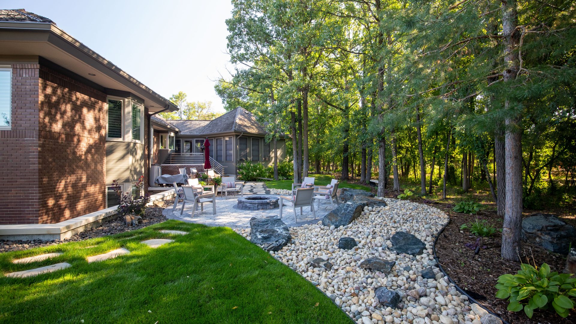 Limitless Landscaping custom softscaping and fire pit project in Winnipeg, Manitoba