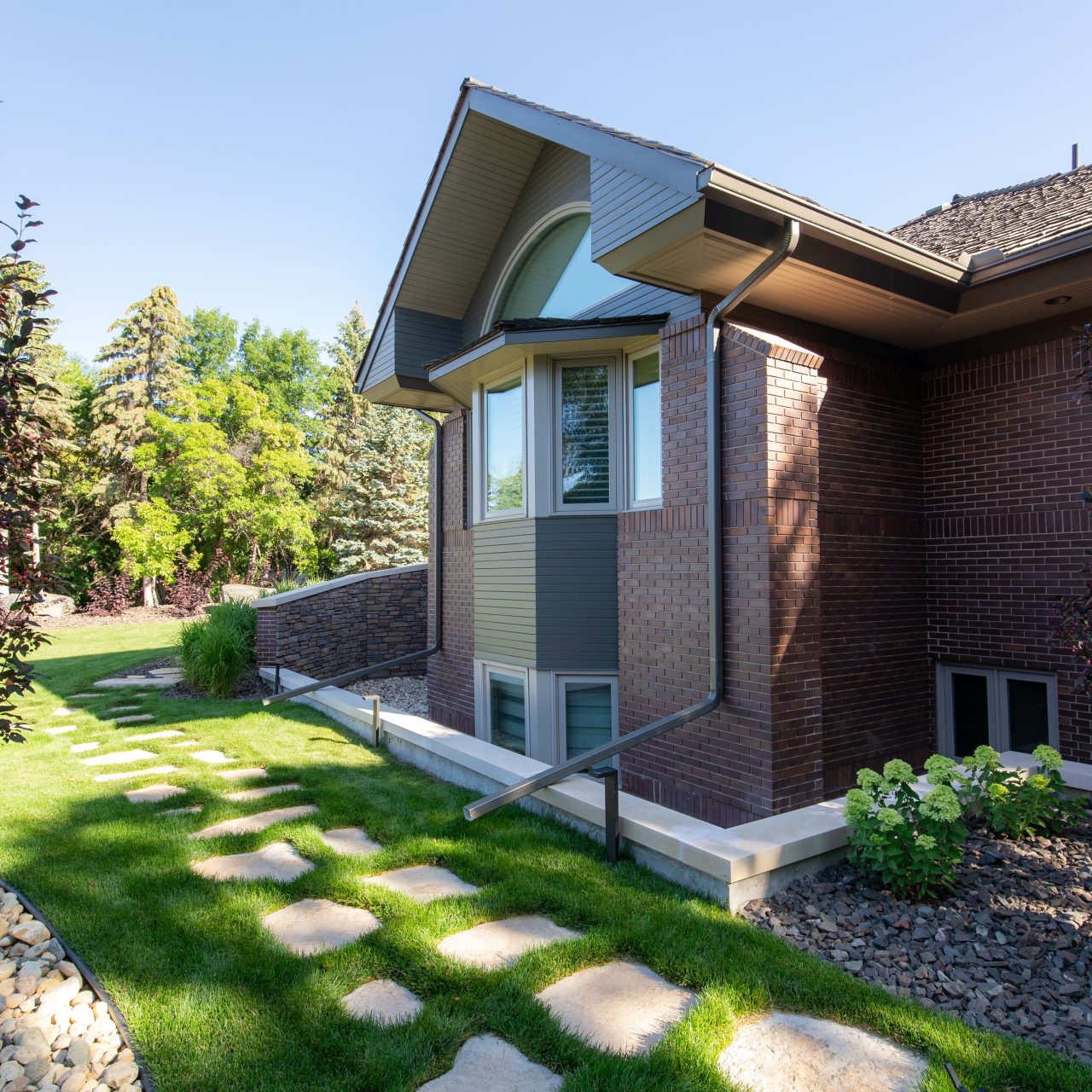 Limitless Landscaping customized softscaping with pathway in Winnipeg, Manitoba