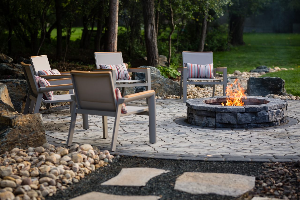 Limitless Landscaping custom patio and fire pit hardscaping project in Winnipeg, Manitoba