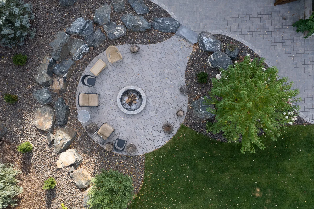 Limitless Landscaping custom hardscaping fire pit area in Winnipeg, Manitoba