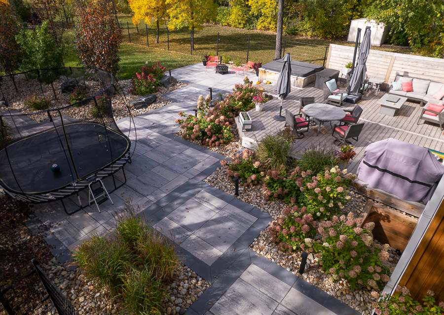 Limitless Landscaping backyard patio and softscaping project in Winnipeg, Manitoba