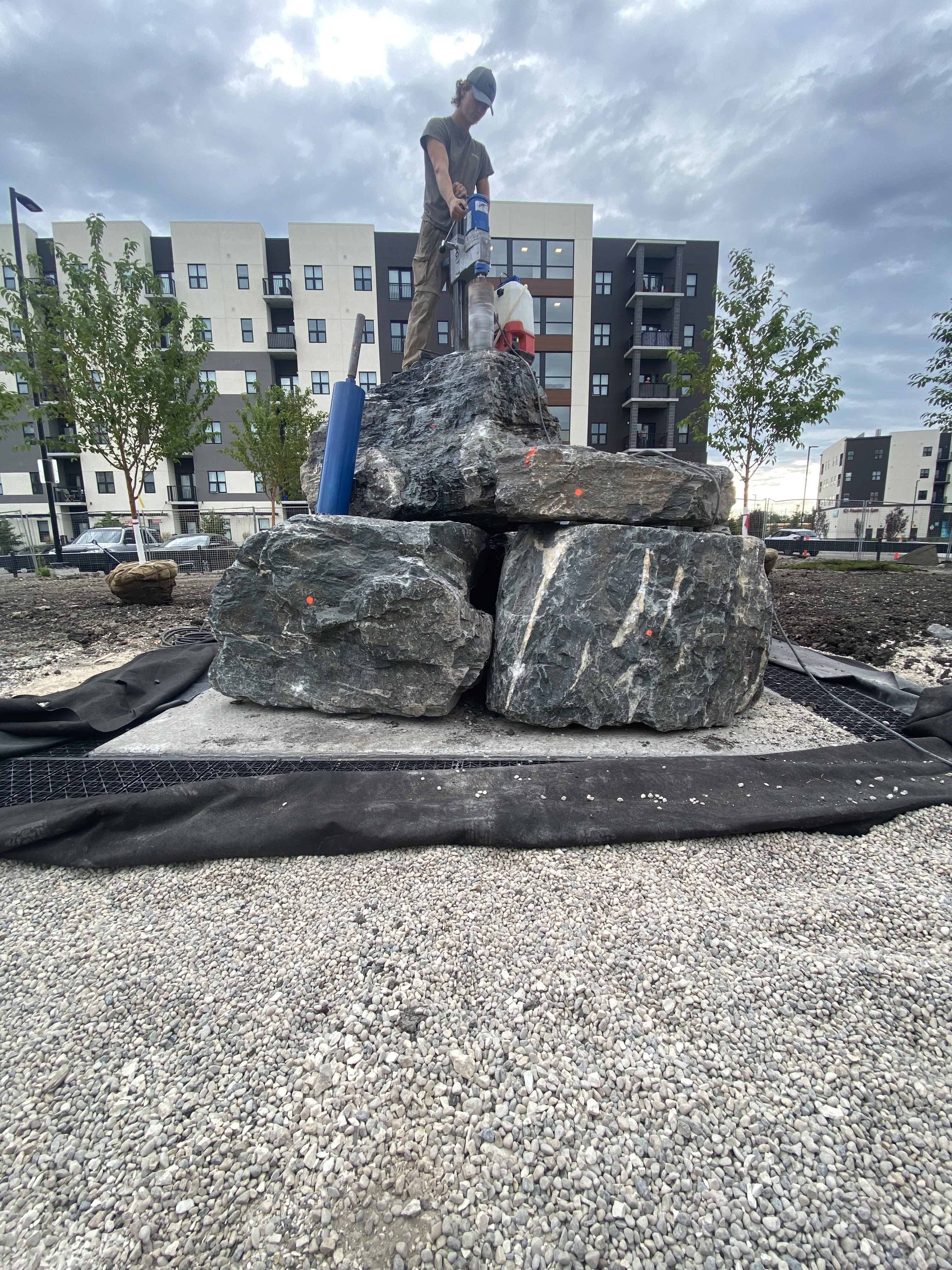 Limitless Landscaping hardscaping project with boulders on Plessis Rd, Winnipeg, Manitoba