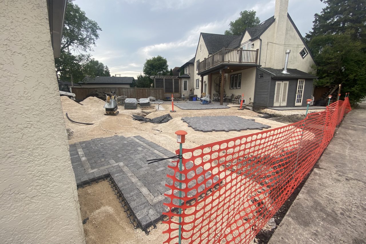 Limitless Landscaping patio hardscaping project underway in Winnipeg, Manitoba on Lanark St