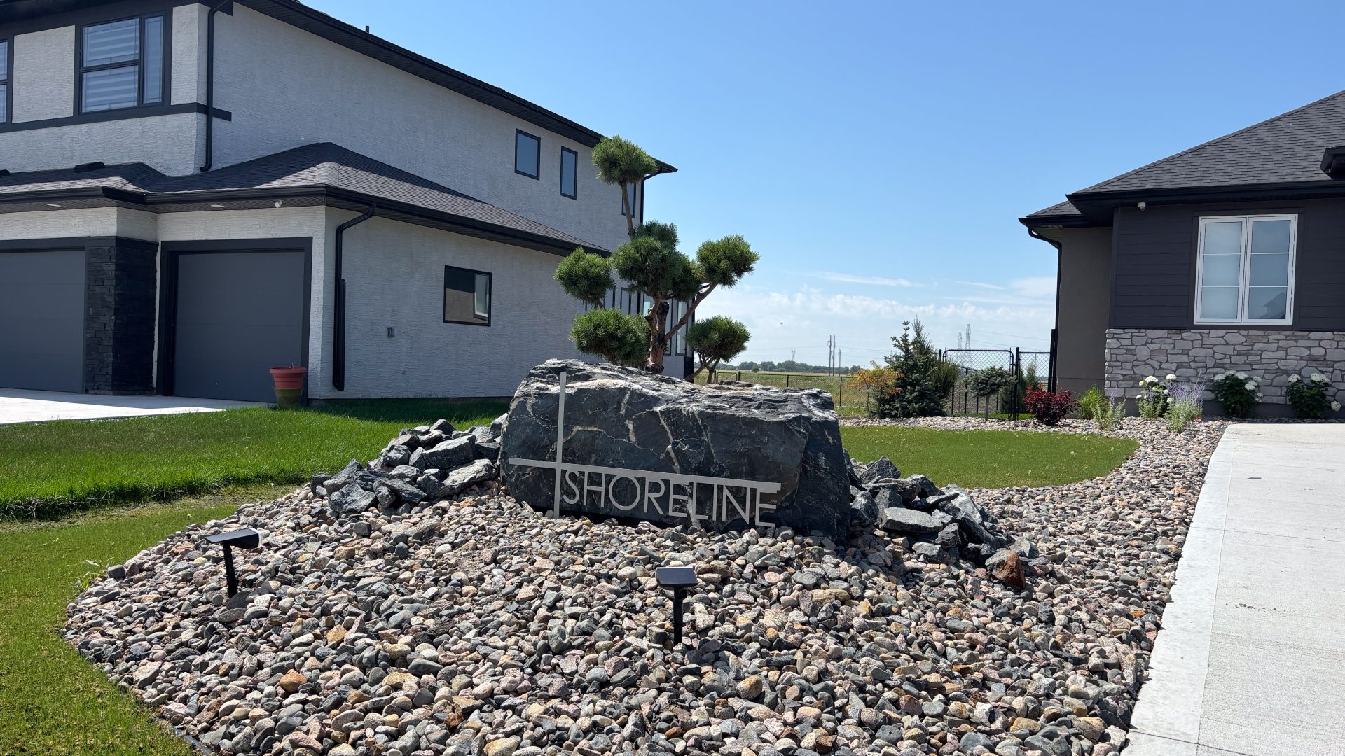 Limitless Landscaping decorative rock design at Shoreline Dr, Winnipeg, Manitoba landscape project