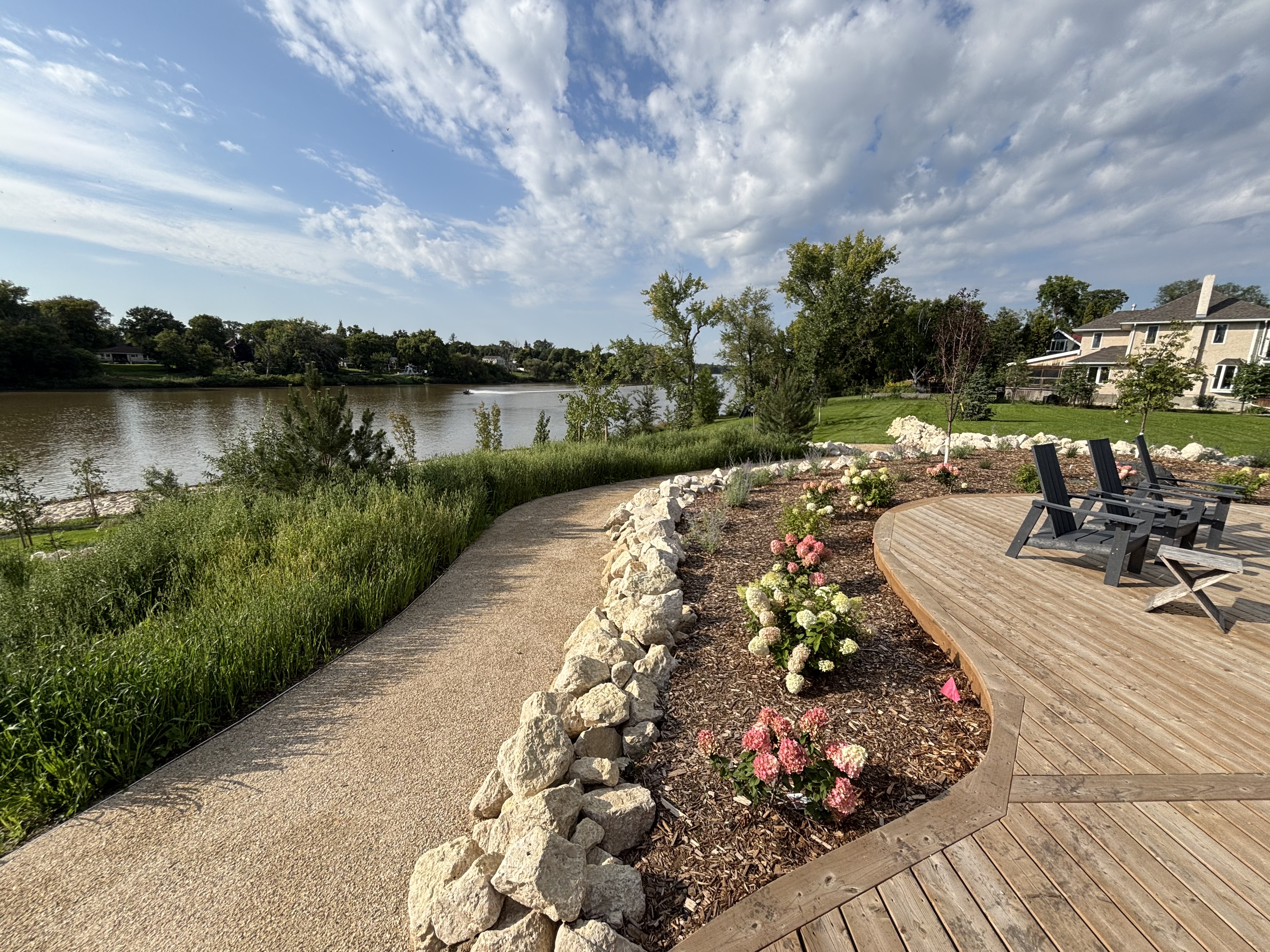 Limitless Landscaping softscaping and patio design along the river in Winnipeg, Manitoba.