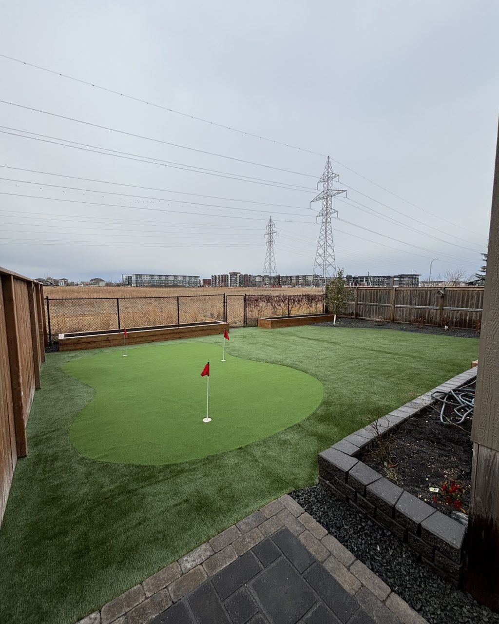 Limitless Landscaping custom putting green installation in Winnipeg, Manitoba