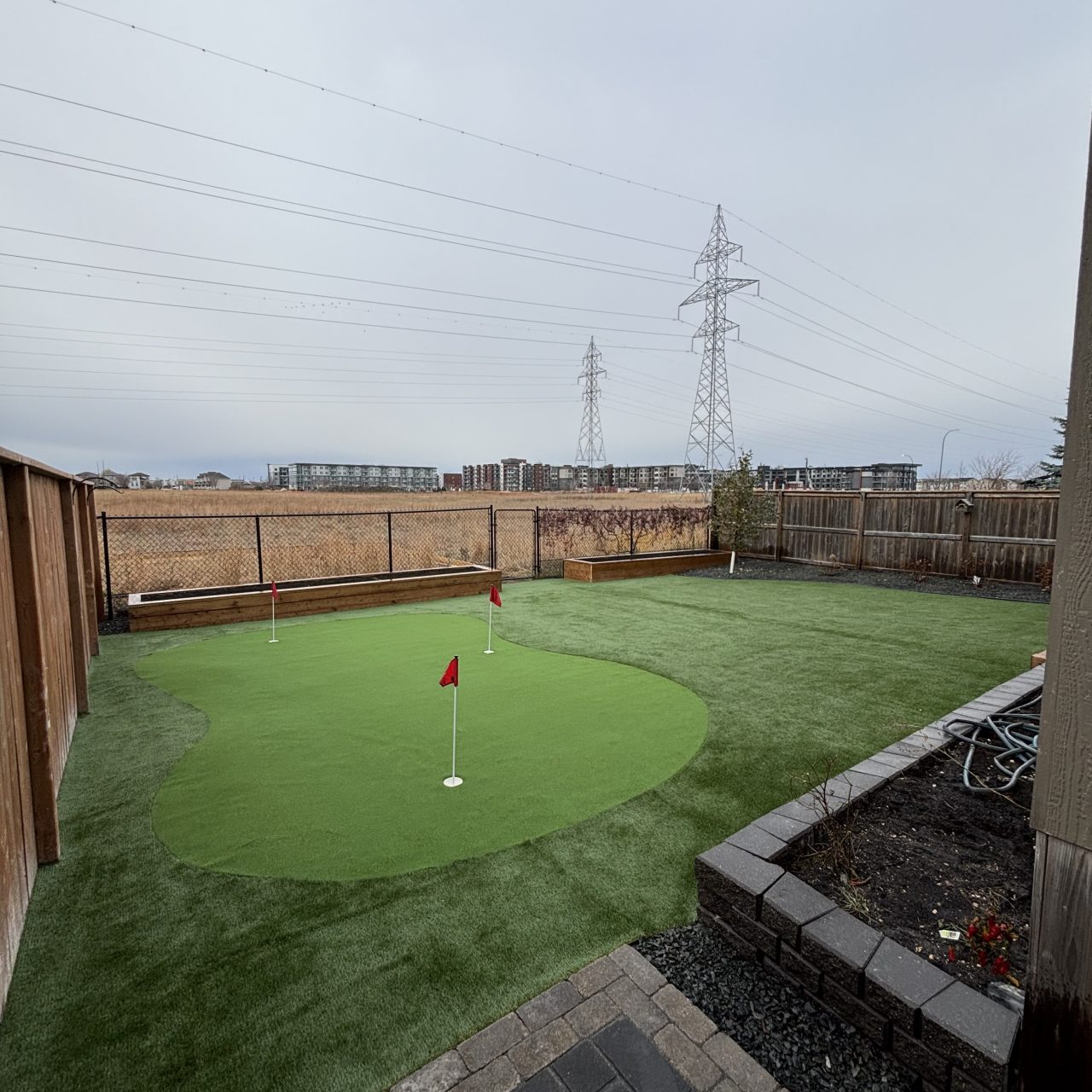 Limitless Landscaping custom putting green installation in Winnipeg, Manitoba